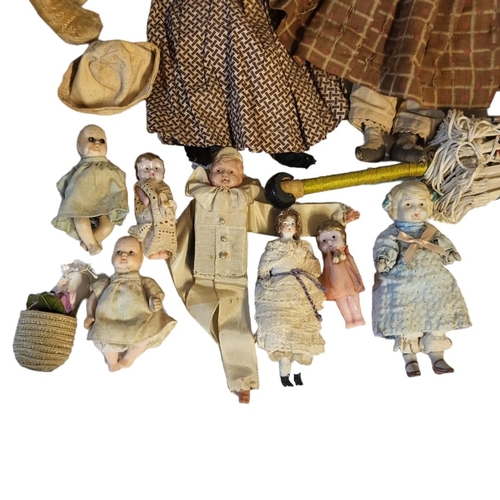 350 - TWO LATE 19TH CENTURY CONTINENTAL CLOTH DOLLS IN ORIGINAL DRESS
A mixed selection of German Bisque h... 