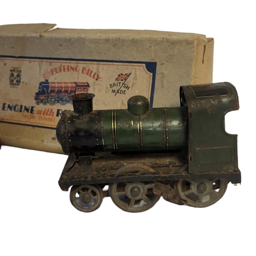 356 - A 1930’S BOXED PUFFING BILLY TINPLATE PAINTED CLOCKWORK MODEL OF LOCOMOTIVE BY WELLS OF LONDON
With ... 