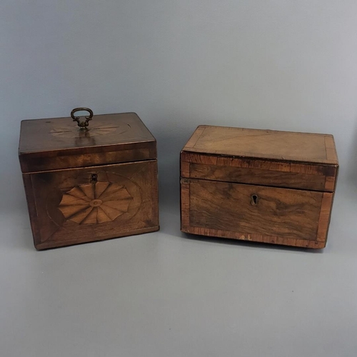 364 - A GEORGIAN MAHOGANY TEA CADDY
Having a brass handle and inlaid Sheraton design shell, together with ... 