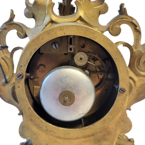 371 - DELETTREZ, A FRENCH 19TH CENTURY GILT BRASS MANTLE CLOCK
Rococo form with scrolled case and white en... 