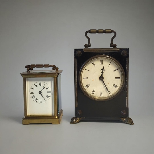 372 - AN EARLY 20TH CENTURY GILT BRASS CARRIAGE CLOCK
Having a single carry handle and four bevelled glass... 