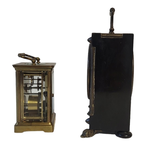 372 - AN EARLY 20TH CENTURY GILT BRASS CARRIAGE CLOCK
Having a single carry handle and four bevelled glass... 