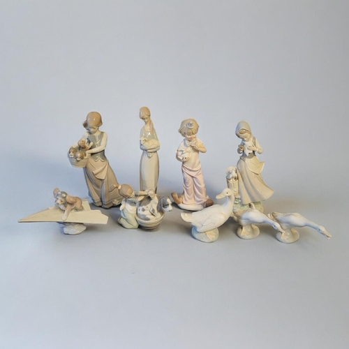 380 - A MIXED COLLECTION OF SEVEN LLADRO NURSERY PORCELAIN FIGURES, CIRCA 1980/1990
Consisting of a young ... 