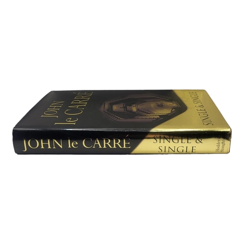 406 - JOHN LE CARRÉ, SINGLE AND SINGLE
Signed to title page, 1999, dust jacket worn and with some shelf we... 