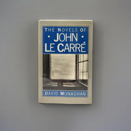 410 - DAVID MONAGHAN, THE NOVELS OF JOHN LE CARRÉ, SIGNED, 1985
Dust jacket worn to edges.