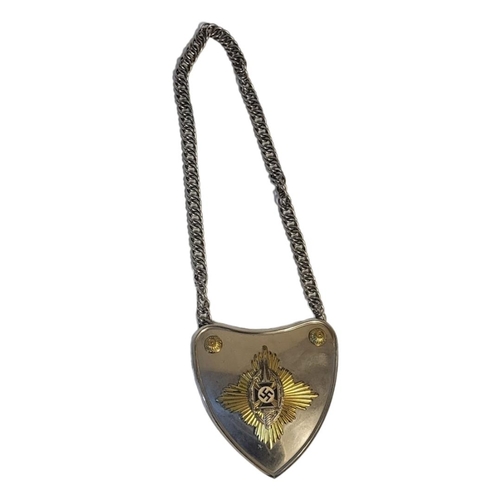 526 - A GERMAN NSKOV STANDARD BEARERS GORGET
Heart form, with raised edge and steel chain.
(approx 14cm x ... 