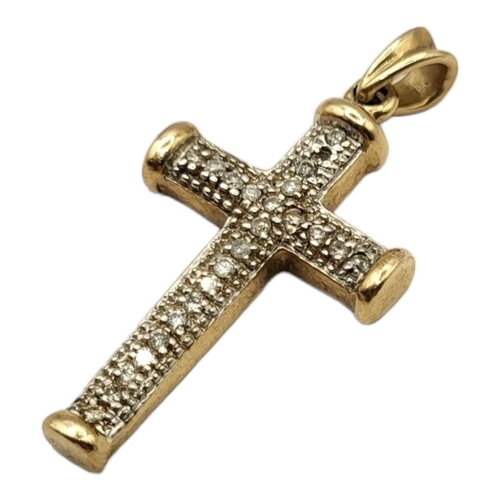 74 - A VINTAGE 9CT GOLD AND DIAMOND CRUCIFIX PENDANT
Set with round cut diamonds.
(approx diamond weight ... 