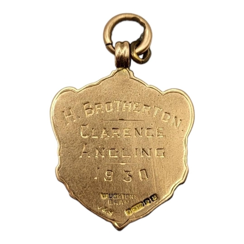 80 - AN EARLY 20TH CENTURY 9CT GOLD AND ENAMEL WATCH FOB
Marked 'Colne and Burnley WMC and IU’, inscripti... 