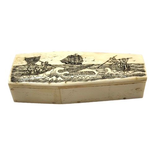 316A - A 19TH CENTURY STYLE BONE SCRIMSHAW TRINKET BOX
In shape of a coffin, with etched whaling scene to l... 