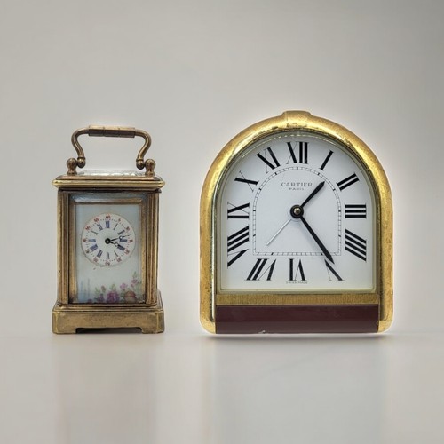 229 - A MINIATURE SÈVRES STYLE FRENCH PORCELAIN AND POLISHED BRASS CARRIAGE CLOCK
Having a glass top with ... 