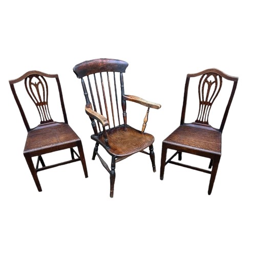 762A - A PAIR OF 18TH CENTURY OAK CHAIRS
With pierced vase splat backs, solid seats,on square chamfered leg... 