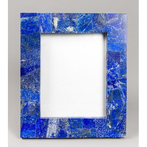 125 - A LAPIS LAZULI PICTURE FRAME
(h 32.5cm x w 28cm x d 3cm)