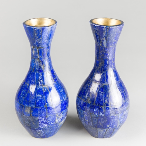 142 - A PAIR OF LAPIS LAZULI VASES
(h 20cm x w 9cm x d 9cm)