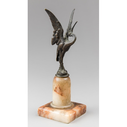 184 - A LATE 19TH/EARLY 20TH CENTURY BRONZE CRANE ON AN ONYX BASE.
(h 21cm)