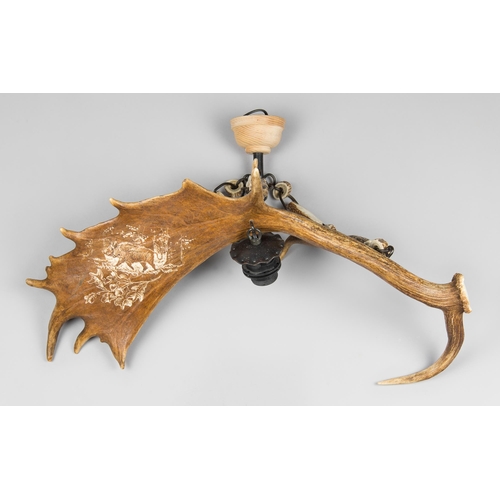 186 - A 20TH CENTURY ANTLER CHANDELIER.
(w 67cm)