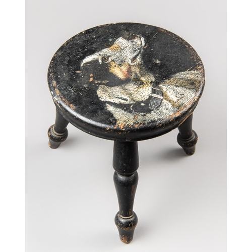 188 - AN UNUSUAL SMALL 19TH CENTURY EBONISED STOOL WITH DOG PAINTING TO THE SEAT, ON THREE SPLAYED TURNED ... 