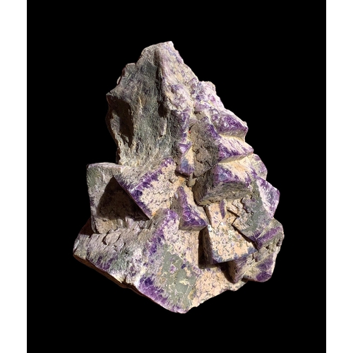 197 - A GIGANTIC FLUORITE SPECIMEN (42KG).
When illuminated with incandescent light fluorite is a purple c... 