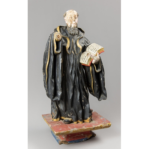 27 - AN 18TH CENTURY ITALIAN WOODEN POLYCHROME SCULPTURE OF ST. BENEDICT OF NURSIA.
Wood carved in full s... 