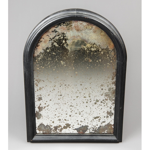 28 - A 19TH CENTURY ARCHED WALL MIRROR WITH HEAVILY FOXED ORIGINAL MERCURY PLATE IN AN EBONISED FRAME. (h... 