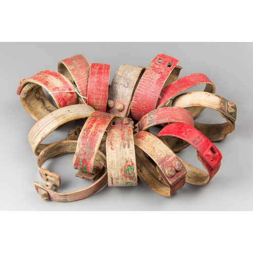 29 - A COLLECTION OF EARLY 20TH CENTURY FRENCH GOAT COLLARS.