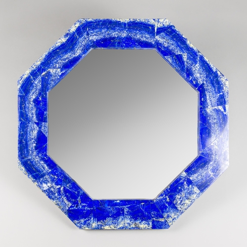 39 - A MADANI LAPIS LAZULI VENEERED OCTAGONAL WALL MIRROR.
Top grade Lapis Lazuli Tumble, made from what ... 