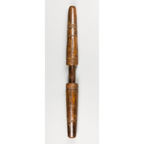 392 - AN UNUSUAL ANTIQUE CARVED TRIBAL WAR CLUB.
(h 78cm). Provenance: Private English collection, 1960-20... 