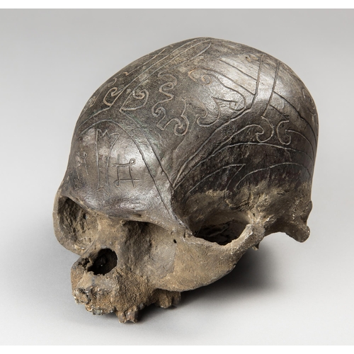 399a - A 19TH CENTURY SCIENTIFIC MEDICAL STUDY DAYAK TRIBAL SKULL.
(h 15cm x w 13.5cm x d 19.5cm)