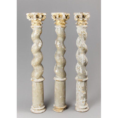 44 - AN 18TH CENTURY SET OF THREE ITALIAN BAROQUE GILT WOOD TWISTED COLUMNS.

(h 75cm)