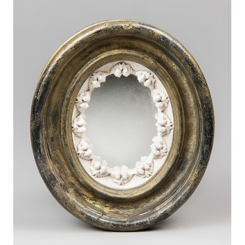 45 - A 19TH CENTURY GILT VANITY MIRROR WITH PLASTER RELIEF OF CHERUBS.
Original mercury glass.
(h 23cm x ... 