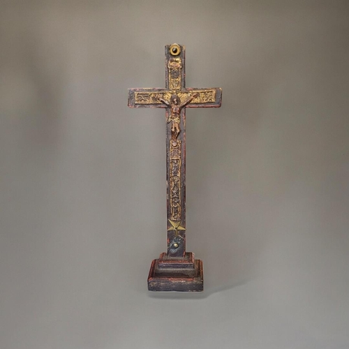 424 - A 19TH CENTURY CARVED WOODEN CRUCIFIX
Having a glass bead mount and carved decoration.
(approx 32cm)... 