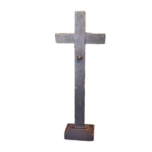 424 - A 19TH CENTURY CARVED WOODEN CRUCIFIX
Having a glass bead mount and carved decoration.
(approx 32cm)... 