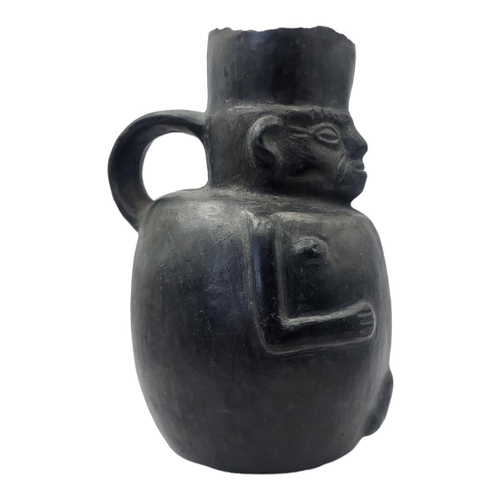 440 - A SOUTH AMERICAN POTTERY EROTIC FIGURAL JUG
Single handle with face mask and pot belly.
(approx 19cm... 