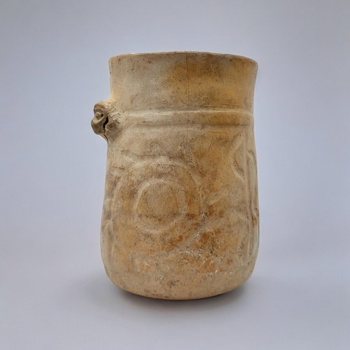 460 - A SOUTH AMERICAN TERRACOTTA POTTERY VASE
Having a single mask and incised decoration.
(approx 16cm)
... 