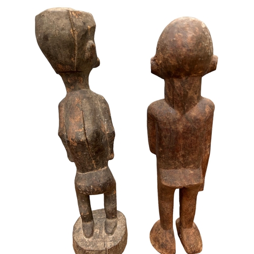 474 - TWO AFRICAN GHANA CARVED WOODEN FERTILITY FIGURES
Male and female in standing pose.
(approx 36cm)

C... 