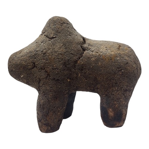 412 - AN AFRICAN EARTH AND ORGANIC MATERIAL 'BAMANA BOLI' FIGURE
Animal with hump in standing pose.
(appro... 