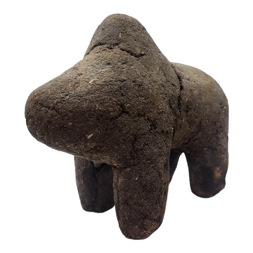 412 - AN AFRICAN EARTH AND ORGANIC MATERIAL 'BAMANA BOLI' FIGURE
Animal with hump in standing pose.
(appro... 