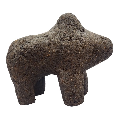 412 - AN AFRICAN EARTH AND ORGANIC MATERIAL 'BAMANA BOLI' FIGURE
Animal with hump in standing pose.
(appro... 