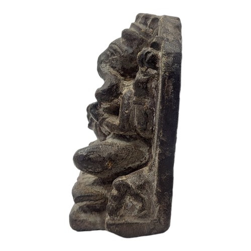 413 - AN AN INDIAN BUDDHIST CARVED STONE GANESH FIGURE
Seated pose with flatback.
(approx 9cm x 10cm)

Con... 