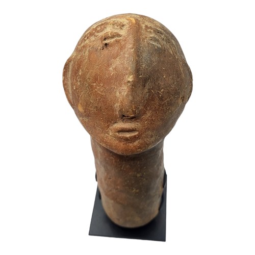 415 - AN AFRICAN TERRACOTTA BURA TRIBE FUNERARY SCULPTURE
Carved facial features on tapering base.
(approx... 