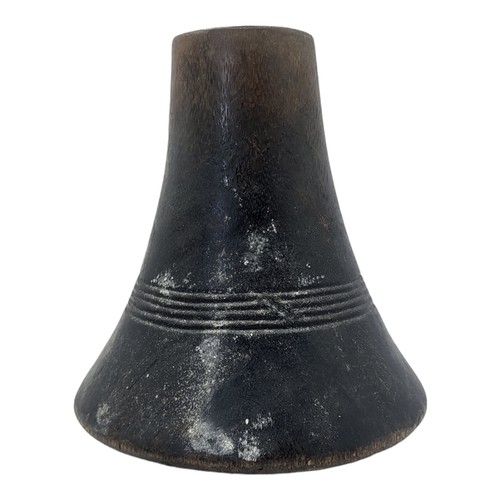 417 - AN AFRICAN CARVED WOODEN RWANDA TUTSI MILK JUG
Conical form with applied metallic mound and dome for... 