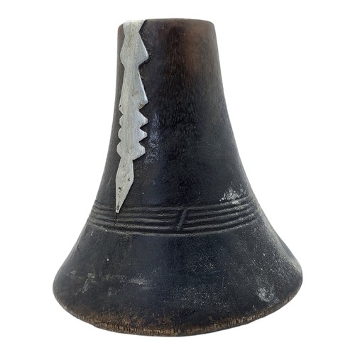 417 - AN AFRICAN CARVED WOODEN RWANDA TUTSI MILK JUG
Conical form with applied metallic mound and dome for... 