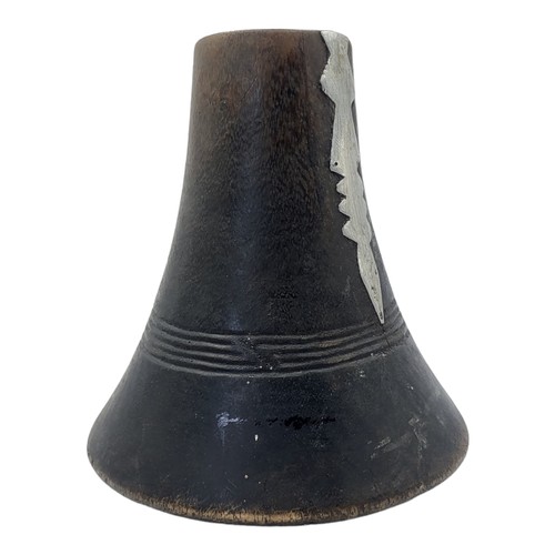 417 - AN AFRICAN CARVED WOODEN RWANDA TUTSI MILK JUG
Conical form with applied metallic mound and dome for... 