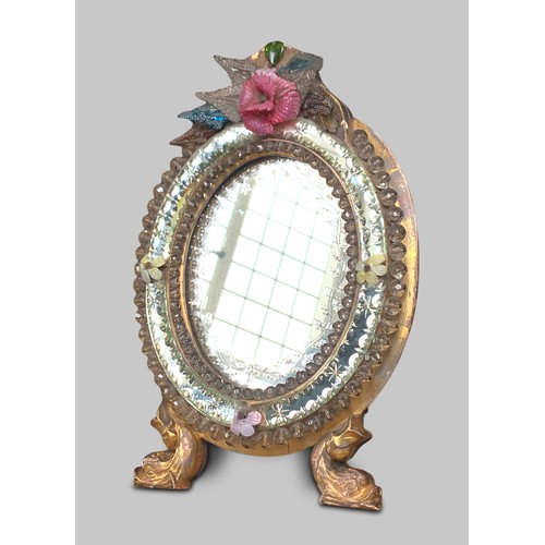 133 - A RARE LATE 19TH/EARLY 20TH CENTURY VENETIAN GLASS AND GILT WOOD FLOWER TABLE MIRROR.
(h 42cm x w 29... 