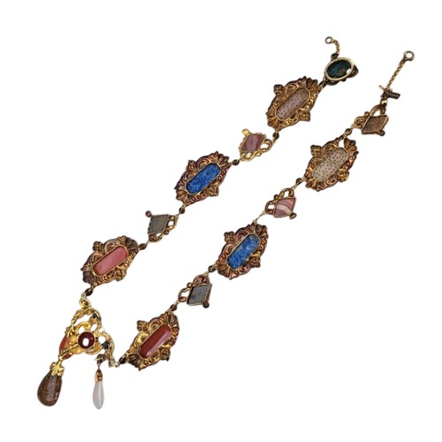 101 - A 19TH CENTURY YELLOW METAL, CARNELIAN AND SPECIMEN HARDSTONE JEWELLERY SUITE
Comprising a necklace ... 