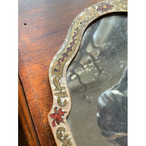 90 - AN 18TH/19TH CENTURY BOULLE DRESSING MIRROR.
The frame in brass and tortoiseshell marquetry on mothe... 