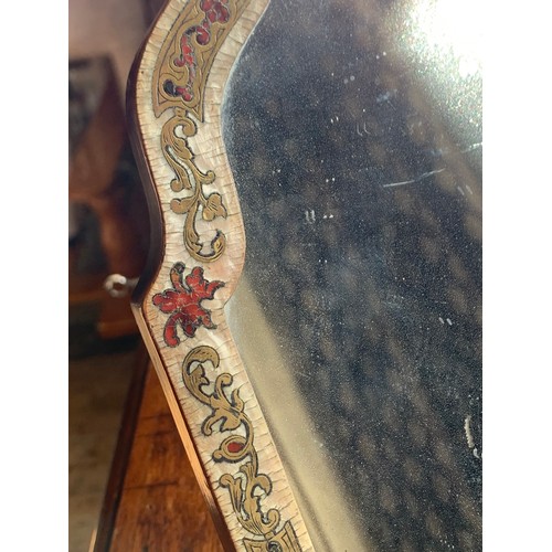 90 - AN 18TH/19TH CENTURY BOULLE DRESSING MIRROR.
The frame in brass and tortoiseshell marquetry on mothe... 