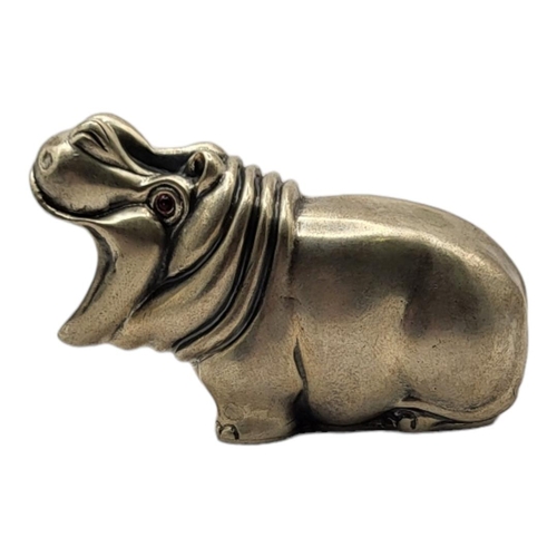 22A - AFTER FABERGÉ, A SILVER PLATED HIPPO PAPER WEIGHT
With ruby glass eyes, stamped with Russian hallmar... 