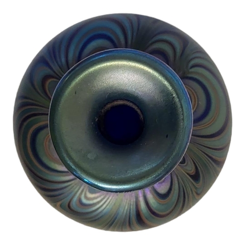 353 - A 20TH CENTURY ART GLASS VASE
Globular form with iridescent decoration, engraved mark to base.
(appr... 