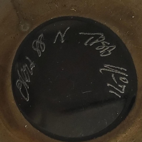 353 - A 20TH CENTURY ART GLASS VASE
Globular form with iridescent decoration, engraved mark to base.
(appr... 