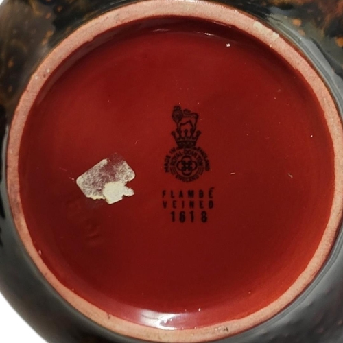 380 - ROYAL DOULTON, A MID 20TH CENTURY FLAMBE VEINED RANGE BOTTLE FORM VASE
Pattern no: 1818, designed af... 
